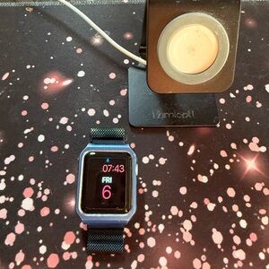 Apple Watch Series 6 with blue case + charging cord (stand not included)